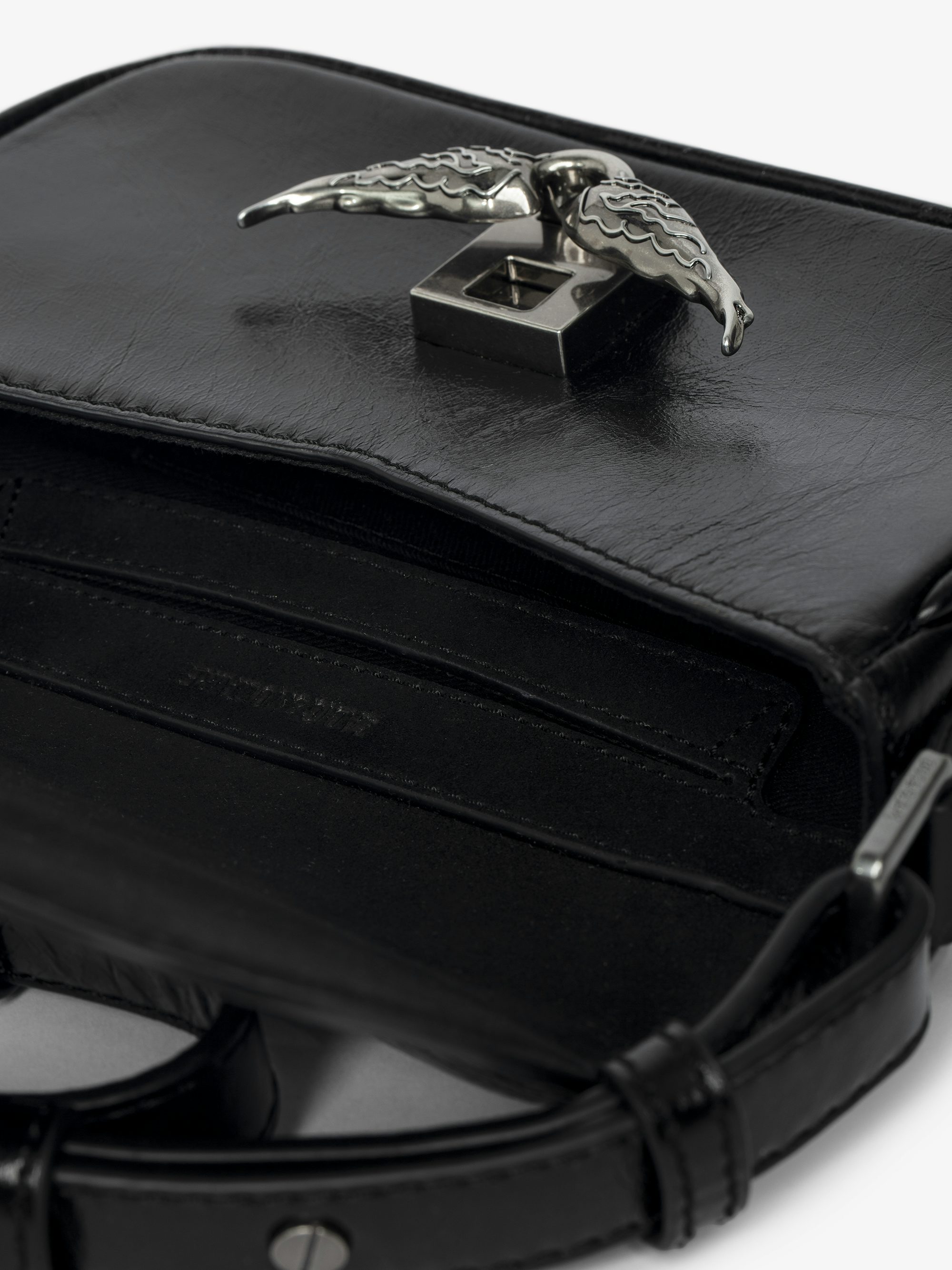 Le Zazi Vintage Patent Bag - Small vintage-inspired patent leather bag with adjustable shoulder strap and signature wings.